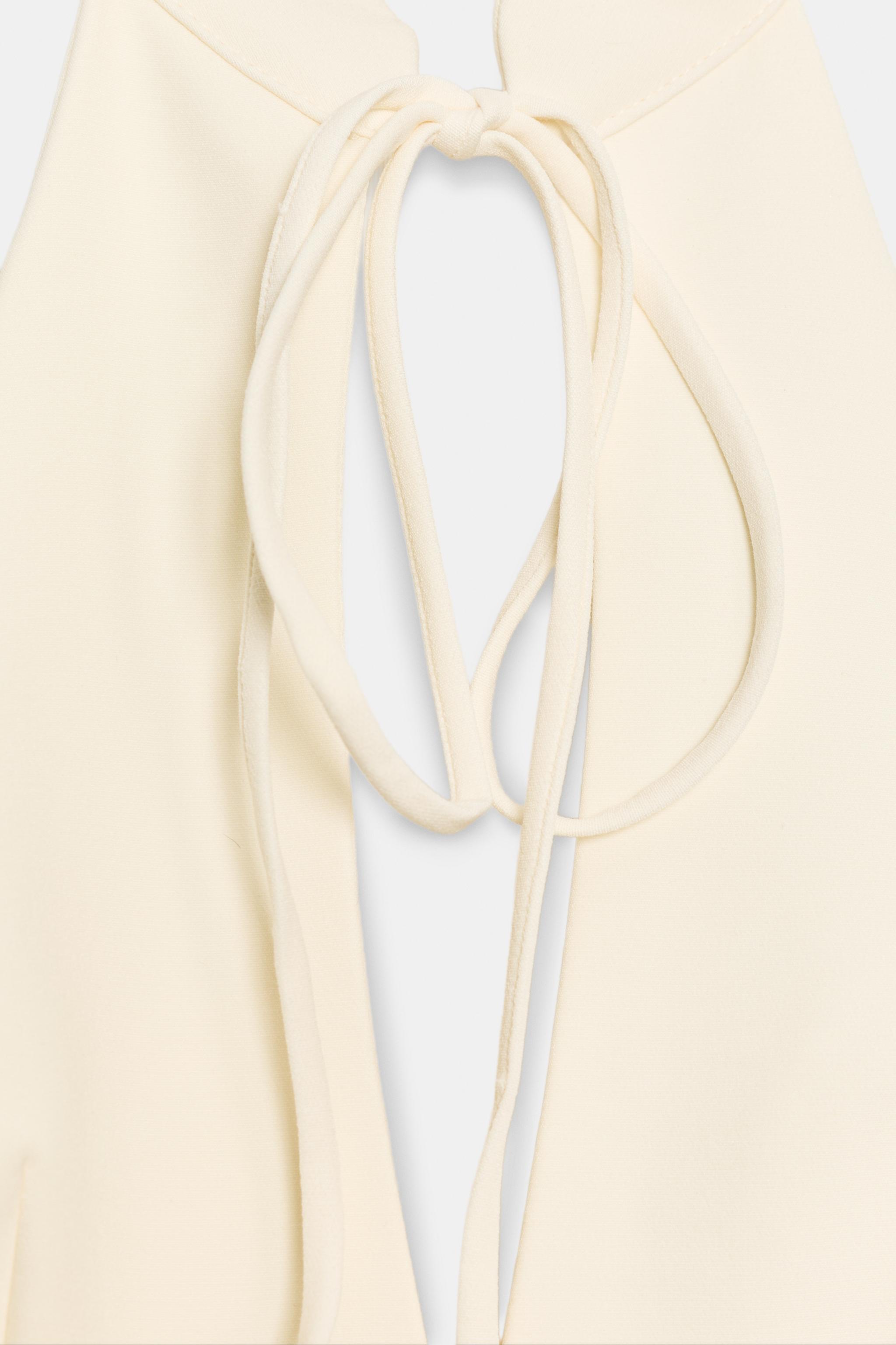 VOLUMINOUS HALTER MINI DRESS